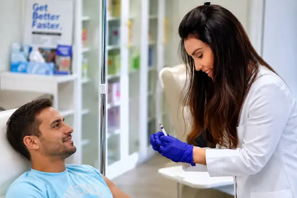 Dr. Mahsa Tehrani giving IM Shot Dr. Mahsa Tehrani giving IM Shot